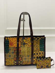 กระเป๋าใส่แล็ปท็อปลายดอกไม้สีเหลืองพิมพ์ลายสกรีนทันสมัย พร้อมช่องใส่ของขนาดใหญ่ เป็นมิตรกับสิ่งแวดล้อม ใส่เครื่องดื่มได้ แถมกระเป๋าเล็กฟรี - Product Image 6