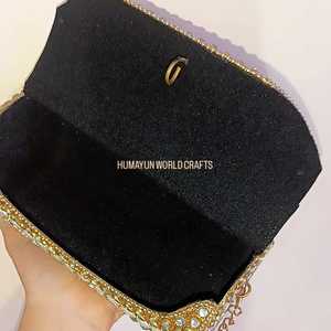 Elegant <b>gold</b> kundan work <b>clutch</b> with pearls and crystals, handcrafted for weddings, parties, and festive occasions. - Product Image 4