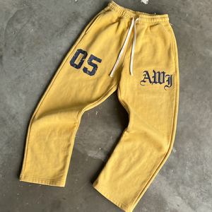 Pantalon de survêtement jaune en coton pour homme, taille élastique avec cordon de serrage, style décontracté, imprimé lettres, collection automne AWJ 05 - Product Image 1