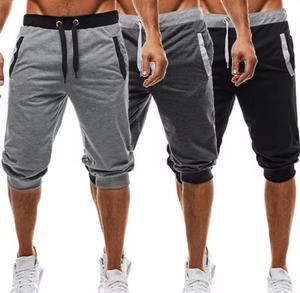 Shorts Bermuda pour Homme en Tissu Oxford Couleur Unie Écologique avec Logo Avant, Bande Latérale et Cordon de Serrage à la Taille – Style Décontracté et Sportif - Product Image 1