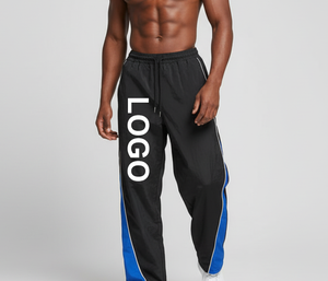 Pantalon de survêtement homme noir et bleu, coupe droite, style vintage, avec bande latérale, cordon élastique, respirant, logo imprimé sur la jambe gauche, collection automne - Product Image 1