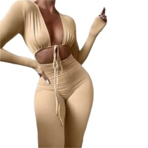 Tute intere aderenti da donna sexy con bendaggio e lacci, a maniche lunghe e scollo a cuore - Product Image 4