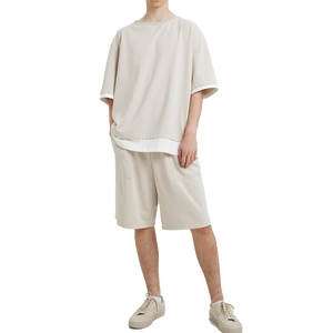 Conjunto de camiseta y pantalones cortos de algodón premium, corte moderno, textura suave, perfecto para ropa urbana y moda diaria. - Product Image 4