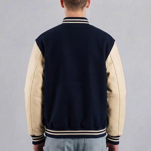 Nouvelle conception de veste varsity personnalisée pour hommes, veste bomber Letterman, corps en laine marine, manches en cuir crème, style universitaire baseball - Product Image 2