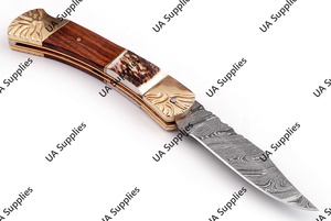 มีดพับด้ามไม้แกะสลักลายเขากวางทองเหลือง พร้อมใบมีดเหล็กดามัสกัสคมกริบ สำหรับตั้งแคมป์กลางแจ้ง บรรจุในซองหนัง รับผลิตแบบ ODM - Product Image 4