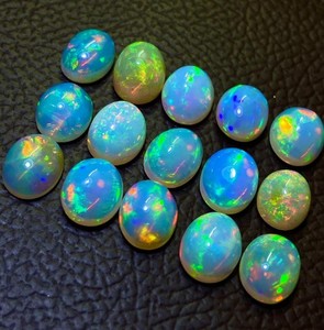 Piedra preciosa de ópalo etíope natural de 8x6 mm - Gemas de ópalo cabujón sueltas de forma ovalada - Piedras lisas con juego de color al por mayor - Product Image 5