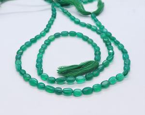 ลูกปัดหินออนิกซ์สีเขียวทรงรีเรียบขนาด 5x7 มม. ลูกปัดพลอยออนิกซ์สีเขียว 13 นิ้ว ลูกปัดหินออนิกซ์สีเขียวธรรมชาติทรงรีสำหรับทำเครื่องประดับ - Product Image 1