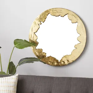 Miroir mural circulaire plaqué or avec bordure irrégulière, design contemporain abstrait, décoration d'intérieur pour salon - Product Image 1