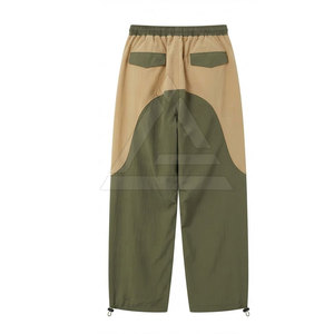 Pantalones de Paracaídas para Hombre con Corte Holgado, Puños Ajustables, Tela Ligera y Bolsillos Laterales para Moda Urbana - Product Image 2
