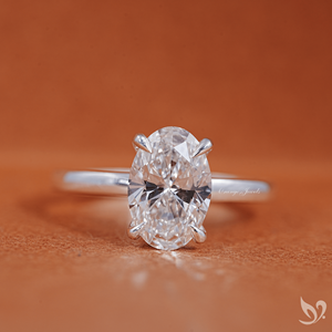 แหวนแต่งงานเพชรทรงรี 2 กะรัต รับรองโดย IGI เพชรเพาะเลี้ยงแบบโซลิแทร์ ประดับด้วยวงแหวนรอบนอกแบบซ่อน |   แหวนแต่งงานทองคำแท้ 10k - Product Image 1