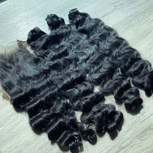 Precio de fábrica 100% Raw Virgin Vietnamita Trama humana Paquete de encaje Onda profunda Color negro natural Super Doble Extensiones de cabello dibujado - Product Image 1