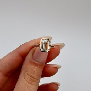 Bold <b>Emerald</b> cut Lab Grown Diamond <b>Ring</b> 3 Carat in bezel Setting with Sleak Polished Band 14k Yellow Gold Statement Design - Product Image 2