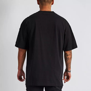 T-shirt en coton noir surdimensionné pour homme, col roulé, manches courtes, couleur unie, jersey tricoté, écologique, respirant, coupe ajustée - Product Image 1