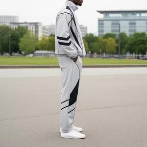 Conjunto de Chaqueta y Pantalones Cortavientos de Nailon Personalizados al por Mayor, Chaqueta Cortavientos con Cierre y Cuello Alto, Traje Deportivo Cortavientos - Product Image 2