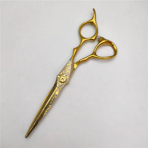 กรรไกรตัดผมมืออาชีพสแตนเลสญี่ปุ่นเคลือบทองคำ รับทำโลโก้ขายส่ง - Product Image 5