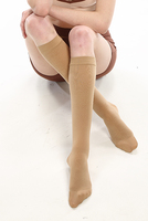 Chaussettes de compression pour femmes, couleur beige, mi-hautes, en nylon tricoté, anti-embolie, pour le traitement des varices
