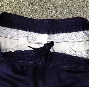 Shorts Bermuda pour homme, couleur unie violette, séchage rapide, taille élastique, avec poches zippées, style décontracté et sportif - Product Image 6
