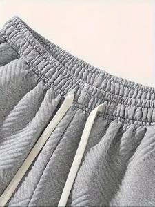 Ensemble de sport décontracté deux pièces pour homme avec t-shirt respirant à manches courtes et short à cordon de serrage pour l'hiver - Product Image 5