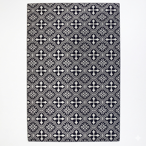 Tapis moderne en laine noir et ivoire à motif floral quadrifoliaire, antidérapant et écologique, pour salon, chambre et intérieurs d'hôtel - Product Image 1
