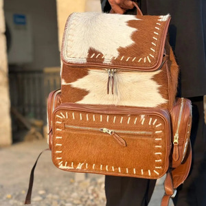 Premium handmade cowhide leather hair on school <b>backpacks</b> wholesale custom OEM supplier high quality student laptop bags - Product Image 1