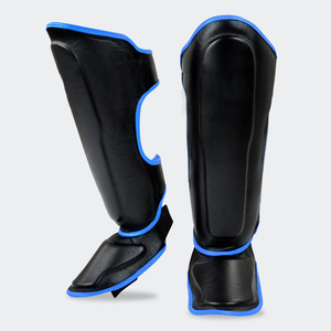Protège-tibias Muay Thai sur mesure, protège-tibias de boxe personnalisés à prix abordable, protège-tibias de boxe MMA OEM personnalisés - Product Image 1