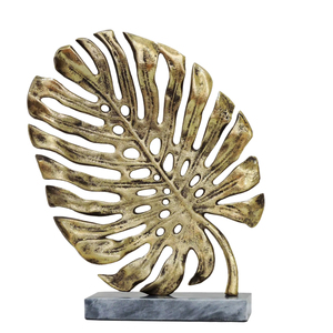 ประติมากรรมใบมอนสเตอร่าสีทองสมัยใหม่ ทำจากอะลูมิเนียม ตั้งบนฐานหินอ่อนสีเทา ตกแต่งด้วยทองเหลืองโบราณ รูปทรงใบปาล์มเขตร้อน สำหรับตกแต่งโต๊ะทำงาน - Product Image 1