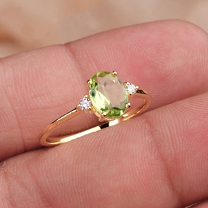 Wholesale 925 Sterling Silver Yellow Gold Plated Natural Oval <b>Peridot</b> CZ 3 Stone <b>Ring</b> Memoria Jewels - Product Image 1