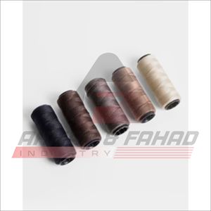 หลอดด้ายเย็บผ้าสีน้ำตาลเบจดำ ยี่ห้ออาห์หมัดและฟาฮัด อินดัสทรี สำหรับงานเย็บปักถักร้อย - Product Image 1