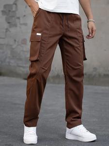 Pantalones cargo modernos de corte ajustado hechos con tela de algodón elástica, con bolsillos profundos, piernas acampanadas y un estilo casual elegante. - Product Image 1