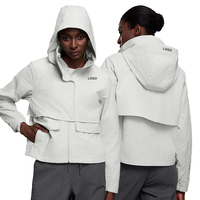 Veste coupe-vent à capuche pour femme, couleur unie, longueur courte, manches longues, fermeture éclair, style utilitaire, vêtements d'automne