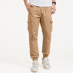Nouveau pantalon décontracté pour homme, couleur unie, taille haute élastique, grandes poches et coupe ajustée, style minimaliste et polyvalent - Product Image 5