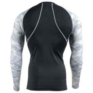 Equipo de lucha resistente y duradero diseñado para sesiones de grappling intensas con una camiseta de compresión con estampado creativo por sublimación. - Product Image 5