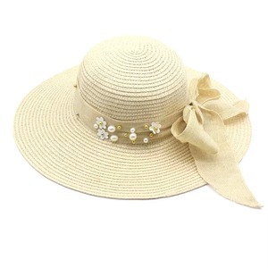 หมวกสานผู้หญิงปีกกว้าง ป้องกันแสงแดดในฤดูร้อน ประดับโบว์ริบบิ้นและมุก ดีไซน์หรูหรา เหมาะสำหรับวันหยุดพักผ่อนริมชายหาด น้ำหนักเบา แฟชั่นเก๋ไก๋ - Product Image 1