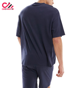 ชุดเสื้อยืดและกางเกงขาสั้นสีพื้นคุณภาพสูง ชุดออกกำลังกายฤดูร้อน เสื้อยืดแห้งเร็วและกางเกงขาสั้น ชุดเสื้อยืดและกางเกงขาสั้นพร้อมโลโก้สั่งทำสำหรับผู้ชาย - Product Image 2