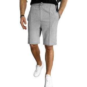 Nouveaux shorts décontractés pour hommes en tissu gaufré uni avec cordon de serrage, polyvalents, pour l'extérieur, style urbain, anti-froissement, séchage rapide, élastiques - Product Image 4