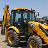 Chargeuse-pelleteuse JCB 4CX d'occasion avec moteur fiable