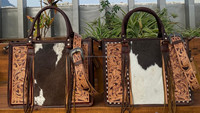 Nouvelle mode de cheveux sur peau de vache sac fourre-tout à pompon en cuir repoussé à fleurs sac à main dissimulé pour femmes sac à main en cuir occidental