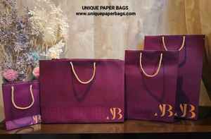Premium <b>Paper</b> Gift Shopping Bags with Gold Rope Handles Wholesale Custom Packaging Solutions - Product Image 2