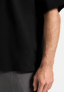 T-shirt en jersey de coton noir surdimensionné pour homme, manches courtes, col rond, décontracté, couleur unie, tricoté, coupe ajustée - Product Image 5