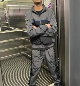 ชุดวอร์มสะท้อนแสง 2 ชิ้น ชุดจ็อกกิ้งผ้าไนลอนยับทรงโอเวอร์ไซส์ เสื้อแจ็คเก็ตกันลม กางเกงขายาว ชุดเซ็ตแทรคสูทสำหรับผู้หญิง - Product Image 5