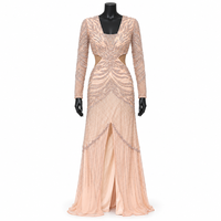 Robe de soirée pêche perlée à découpes avec manches longues transparentes |   Robe de soirée longue avec col en V et fente avant discrète