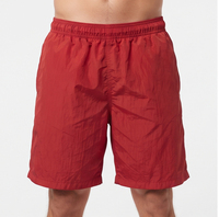 Shorts coupe-vent amples pour hommes, décontractés, 100 % nylon polyester, taille mi-élastique, longueur genou, poches avant et arrière