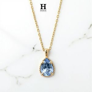 Elegante colgante de piedra azul con corte de pera en oro macizo – Joyería fina - Product Image 1