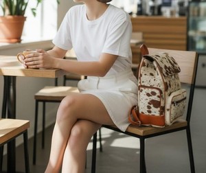 Latest Custom Made Design Real Leather Hair On <b>Backpack</b> Bag Top Selling Fabric Fashionable Double Strap Hair On <b>Backpack</b> Bag - Product Image 1