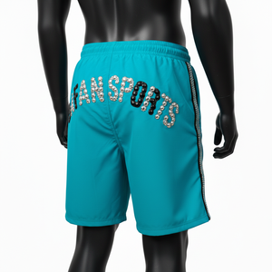 Shorts de baño de poliéster de secado rápido de alta calidad, 140 GSM, color verde azulado con franjas laterales negras y logotipo de diamantes de imitación, ropa de playa para hombre. - Product Image 3