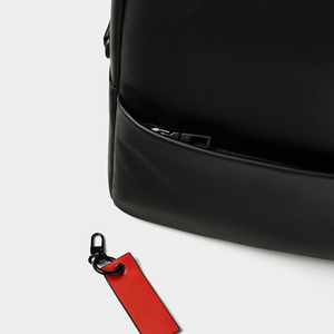 Minimalist Black PU <b>Laptop</b> <b>Backpack</b> with Zipper Closure and Orange Tag Unisex Softback 20-39L Water Resistant Shoulder Straps - Product Image 3
