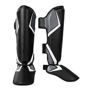 WASEEM IMPEX Protège-tibias unisexes en PU avec logo personnalisé - Équipement de protection durable pour l'entraînement de boxe et de kickboxing toutes saisons - Product Image 1