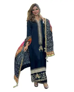 Festivals and special occasioned special designer heavy embroidered top and heavy machine zari worked bottom