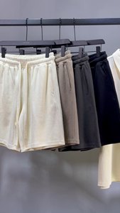 Shorts mi-hauts pour hommes en polyester 100% uni, à taille élastique, décontractés, respirants et à séchage rapide - Product Image 5
