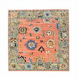 Alfombra Oushak color melocotón, tejida a mano, de lana, con borde verde salvia, diseño floral tradicional, para decoración de sala de estar. - Product Image 1